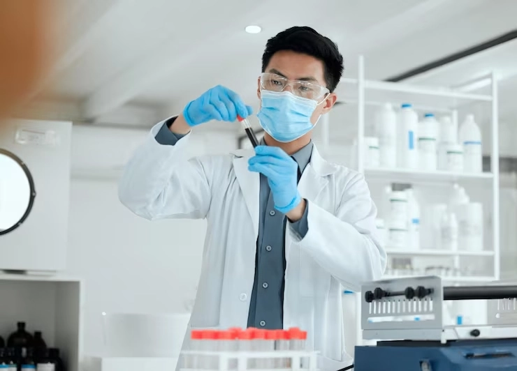 scientist-blood-test-man-laboratory-science-breakthrough-clinical-trial-discovery-dna-vial-medical-biology-mask-vaccine-research-with-vial-mpox-cure-disease-development_590464-478122